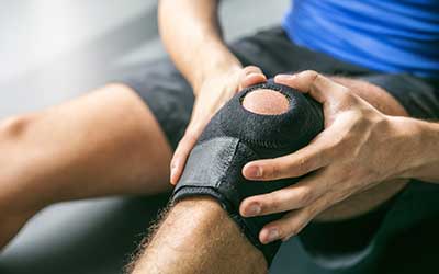 Sports injuries, bandaged knee